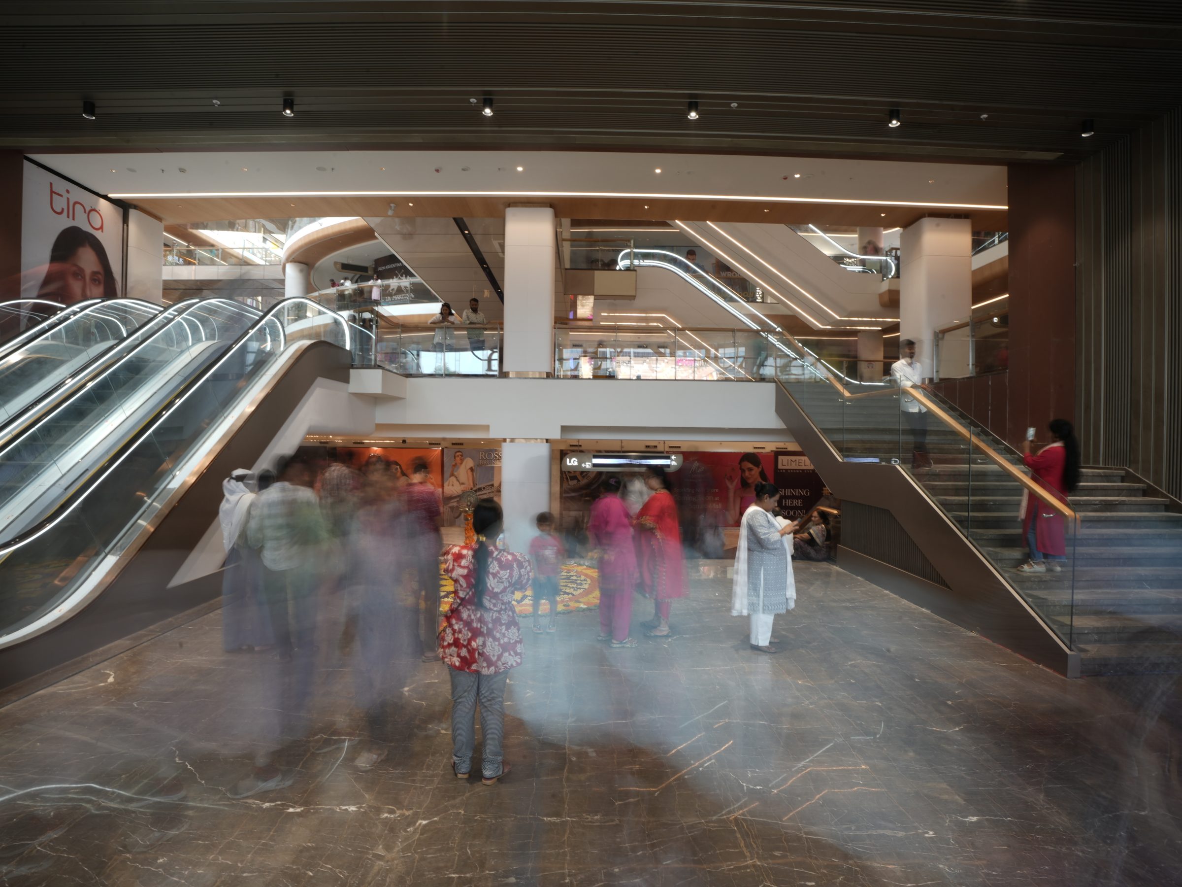Shoppers at the foot of the escalators at Bailey Square, Patna